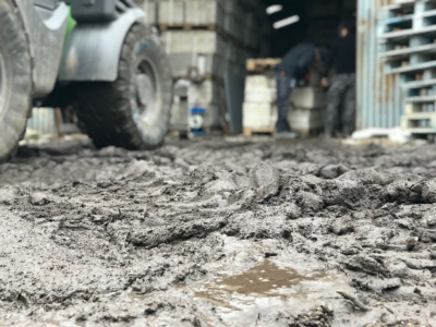 Navigating the mud while removing the old pallets